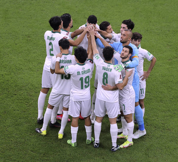 Iraq Players Huddle