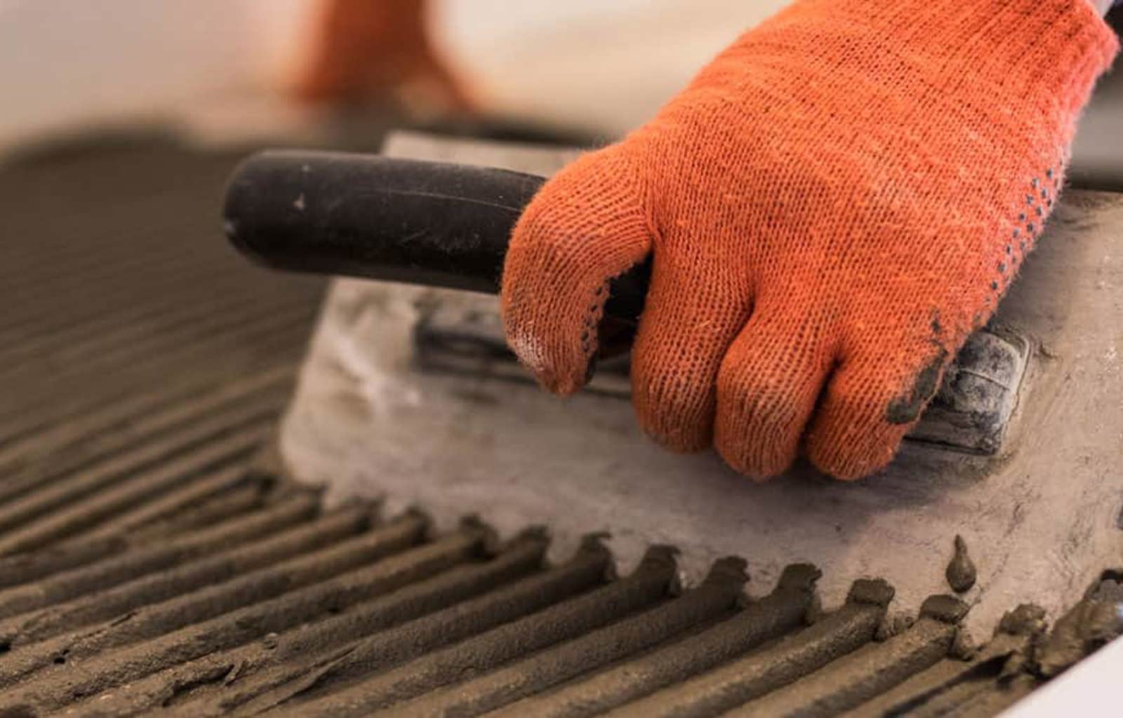 Laying Ceramic Tiles Troweling Mortar Onto Concrete Floor Preparation Laying White Floor Tile Min